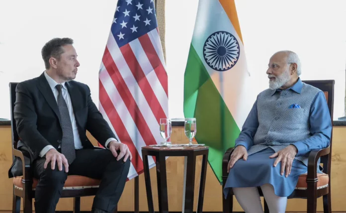 Elon Musk meets PM Modi.png